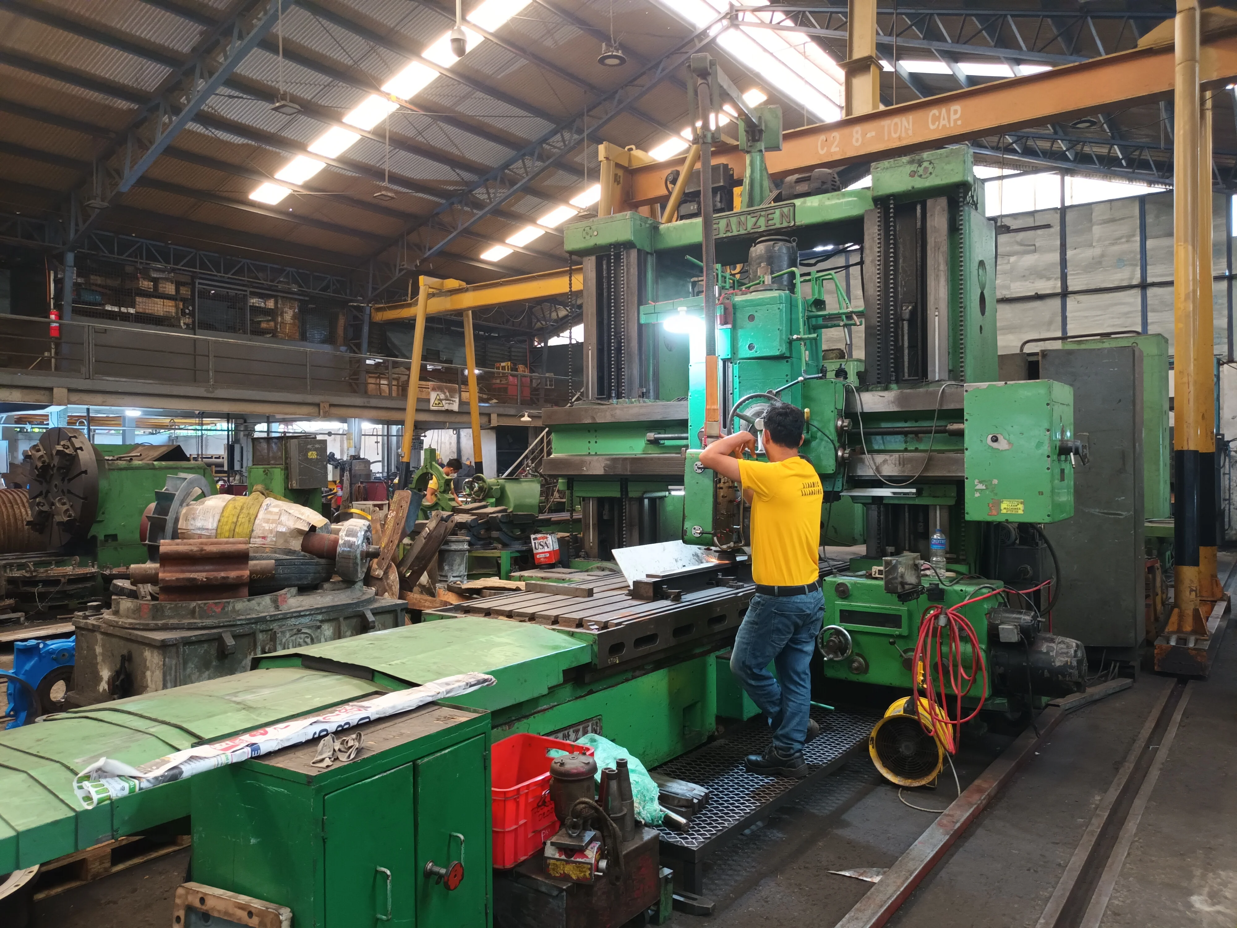 Worker operating large machine